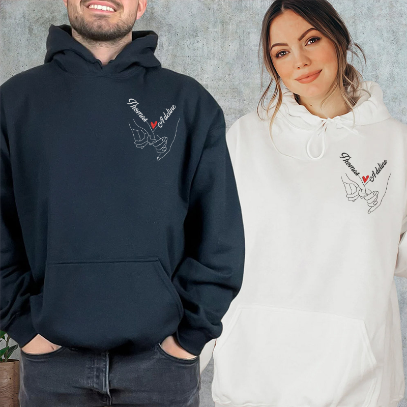 Sweat-shirt brodé main dans la main sur la poitrine gauche