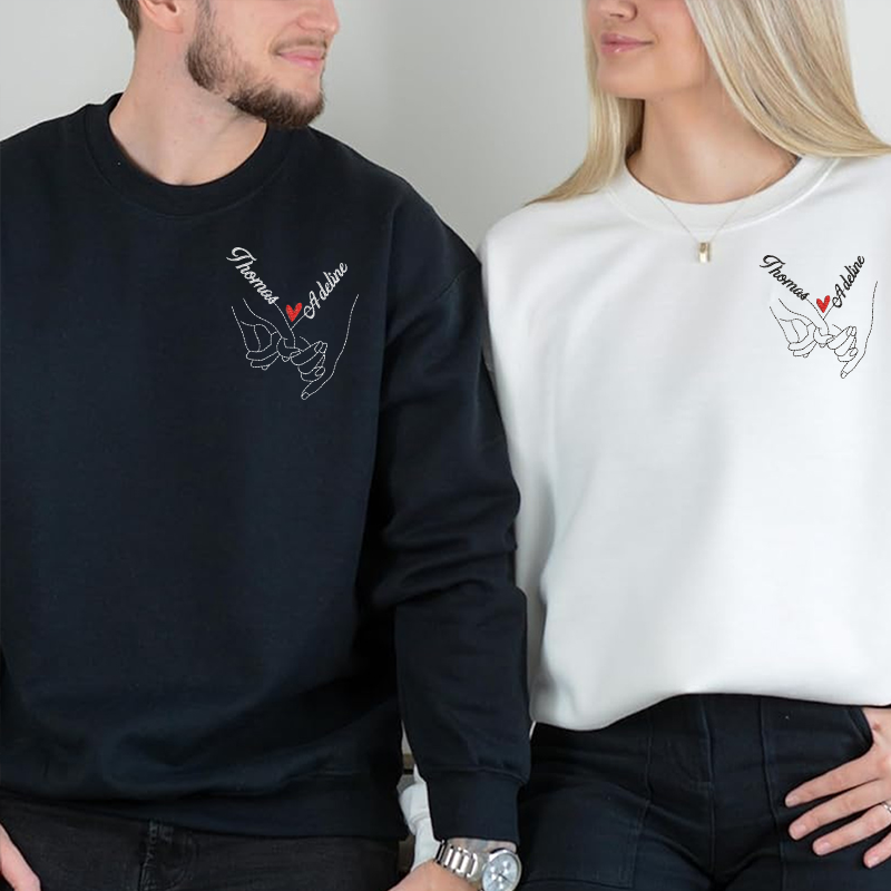Sweat-shirt brodé main dans la main sur la poitrine gauche