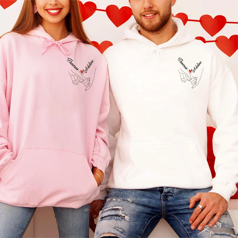 Sweat-shirt brodé main dans la main sur la poitrine gauche