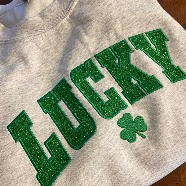 Sweat-shirt porte-bonheur pailleté pour la Saint-Patrick - Nœud appliqué sur le côté