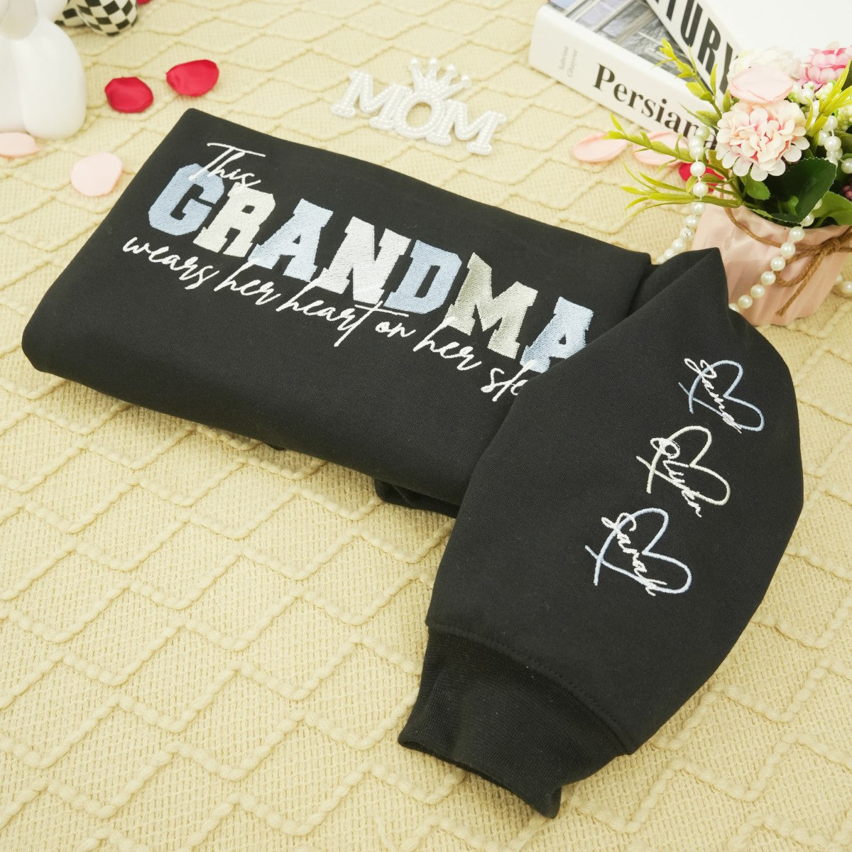 Sweat-shirt brodé personnalisé avec un cœur sur la manche : un cadeau attentionné pour maman et grand-mère