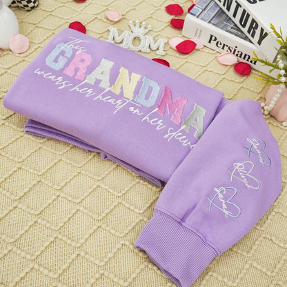 Sweat-shirt brodé personnalisé avec un cœur sur la manche : un cadeau attentionné pour maman et grand-mère